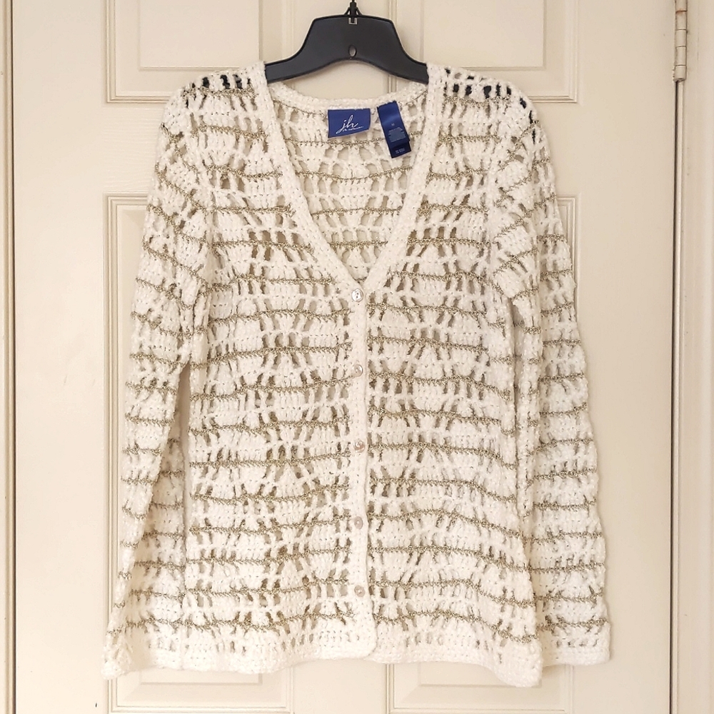 NWOT. Woman's Crochet cardigan sweater with sparkling gold.